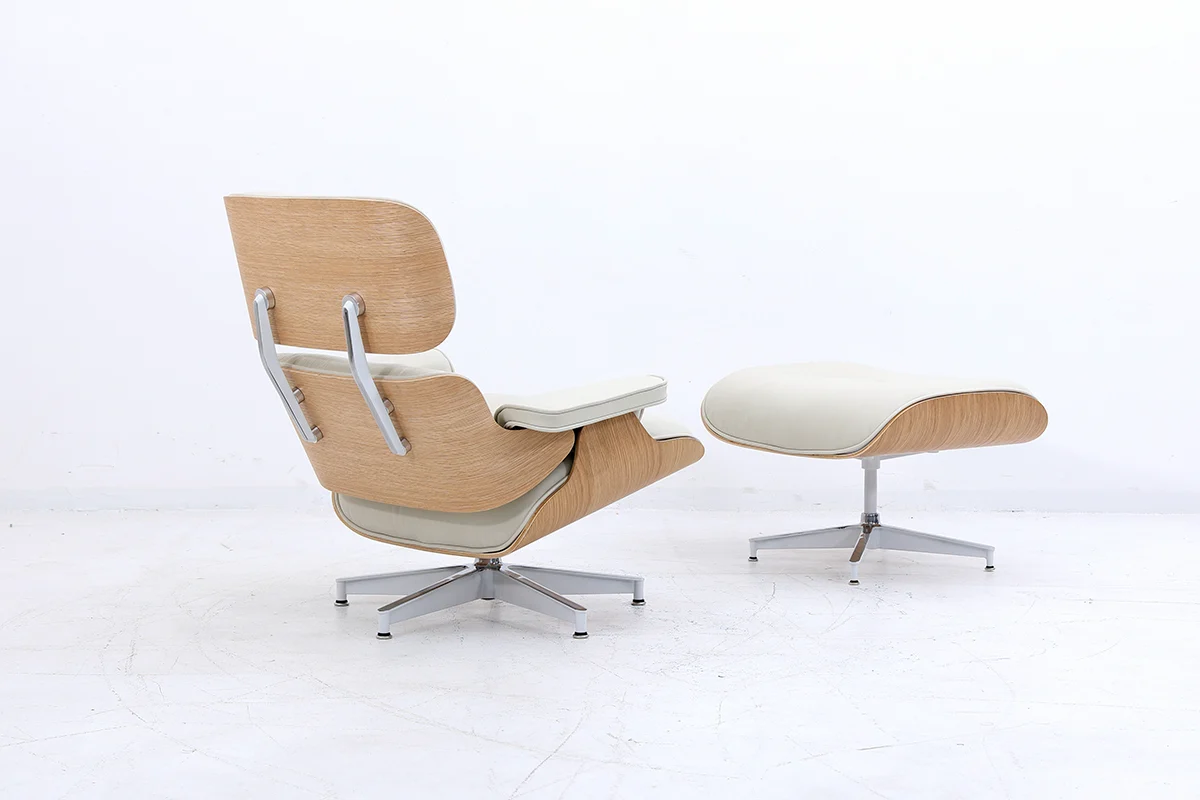 cream leather eames lounge chair with oak wood veneer