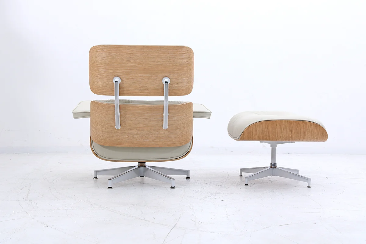 cream leather eames lounge chair with oak wood veneer