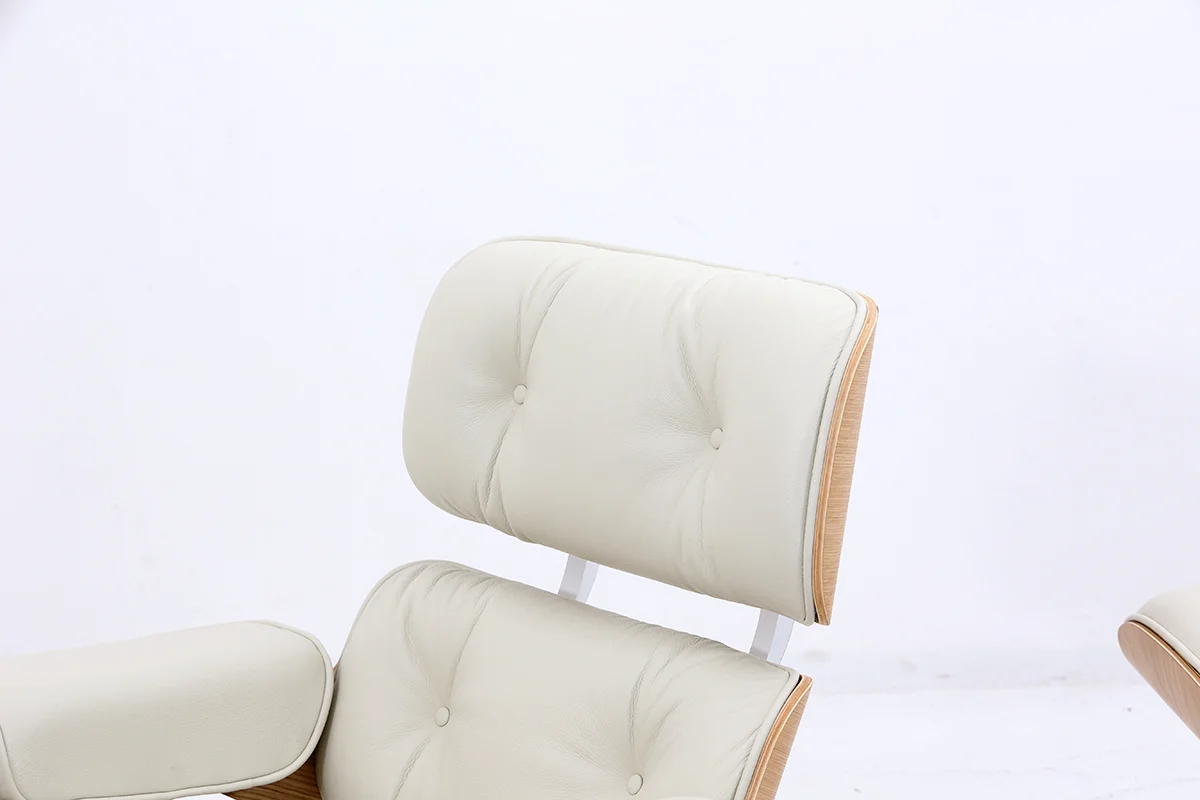cream leather eames lounge chair with oak wood veneer